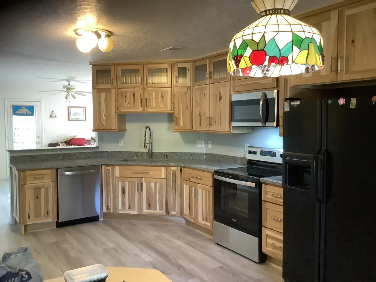 Custom hickory cabinetry kitchen with warm natural grain