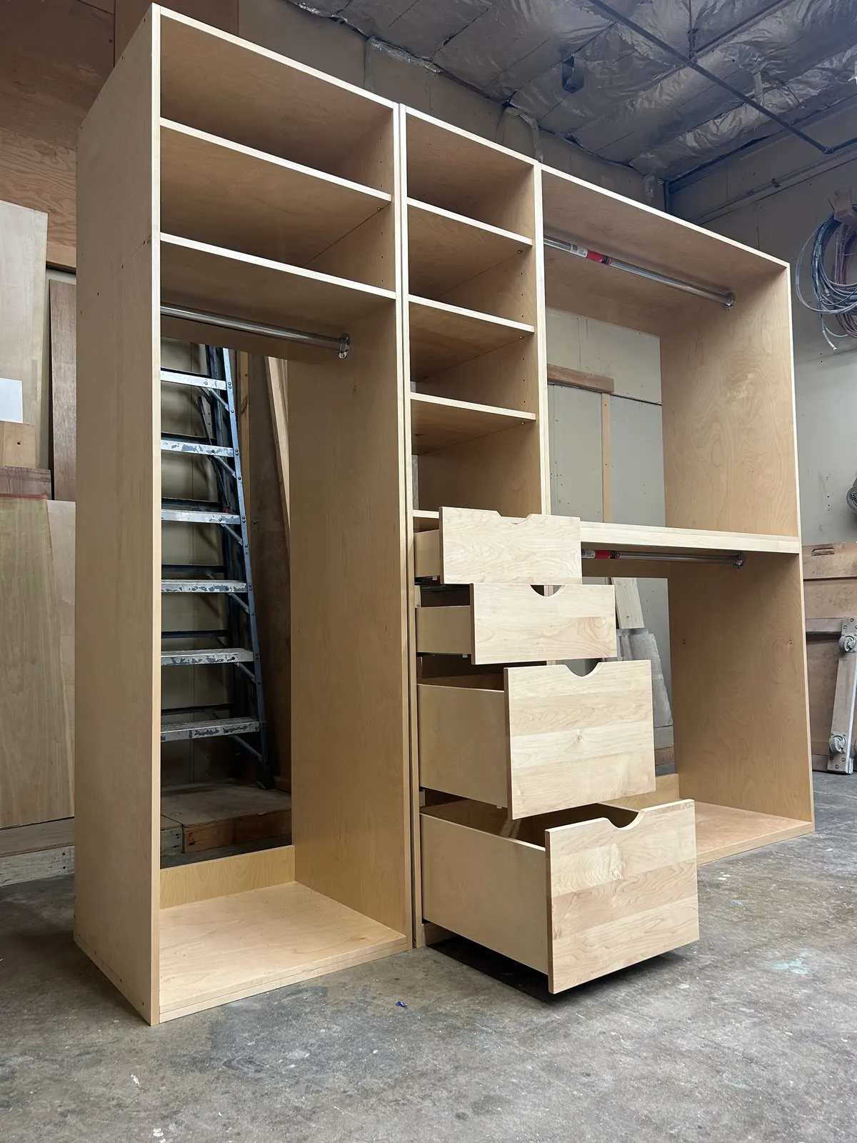 Custom closet cabinetry under construction inside the Ascenso shop